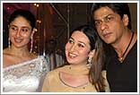 The perfect host: Close friend Shah Rukh Khan welcomes Kareena Kapoor and Karisma Kapoor