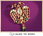 Broach crusted with rubies