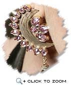 Crescent shaped earring surrounded with pink stones