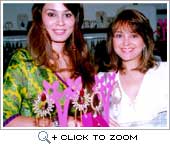 Alisha Chinai admiring Shaheen's collection